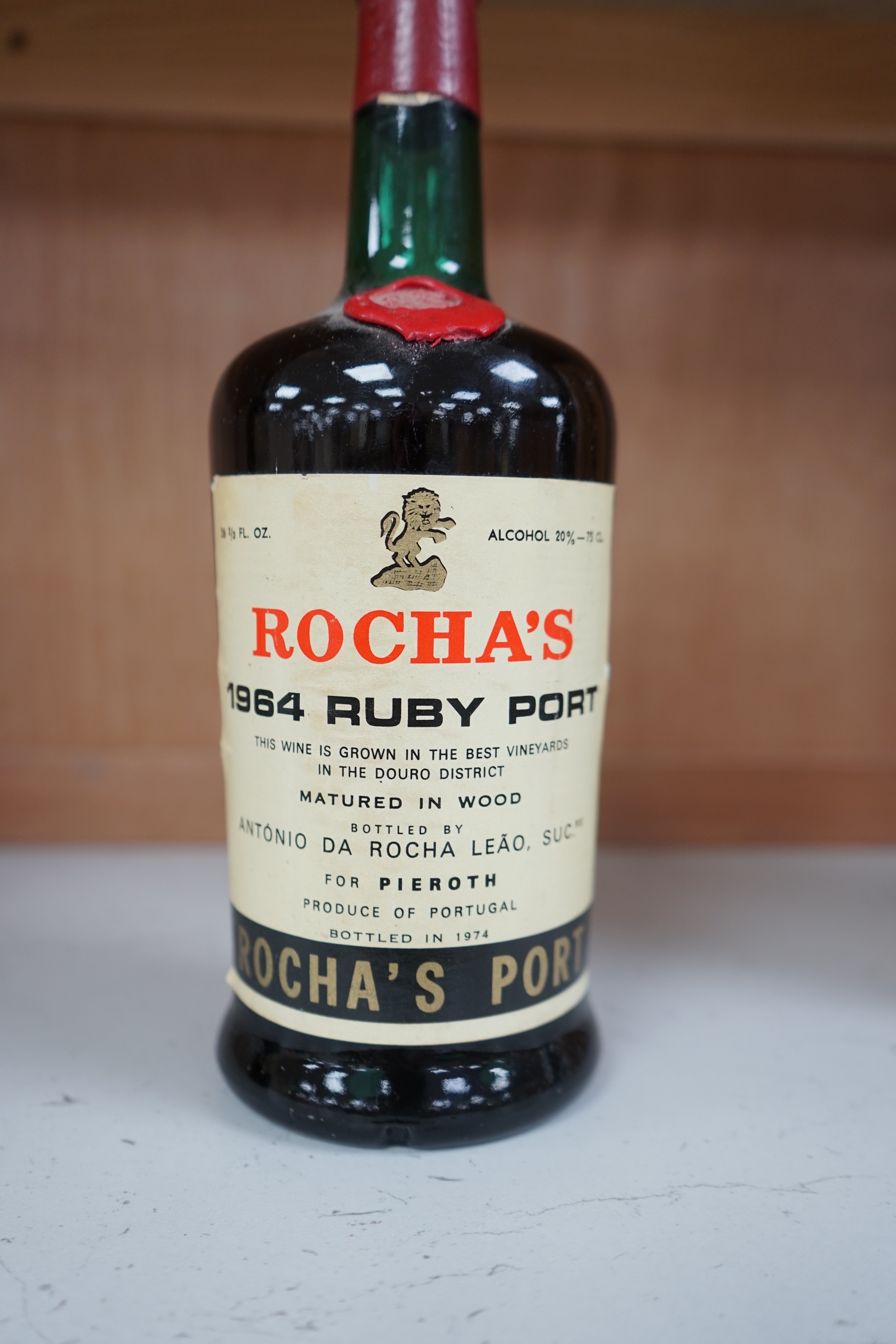 A bottle of Rocha's ruby port 1964. Condition - fair to good.